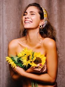 Portrait of Anna K. with sunflowers in Munich